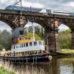 Danny passing under Dutton Aqueduct as an Avanti train passes overhead credit Andrew Gardner Photography